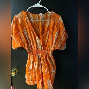 Orange bathing suite cover up. Pool cover up